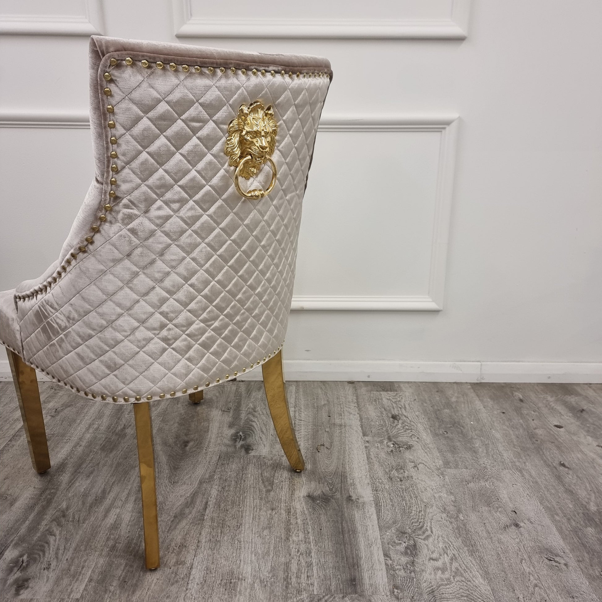 Bentley Gold Dining Chair – Gold Lion Knocker , Studded Border , Quilted Back.